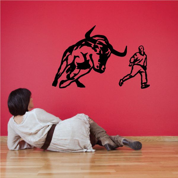 Image of Bull Charging Man Decal