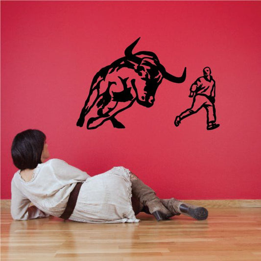 Image of Bull Charging Man Decal