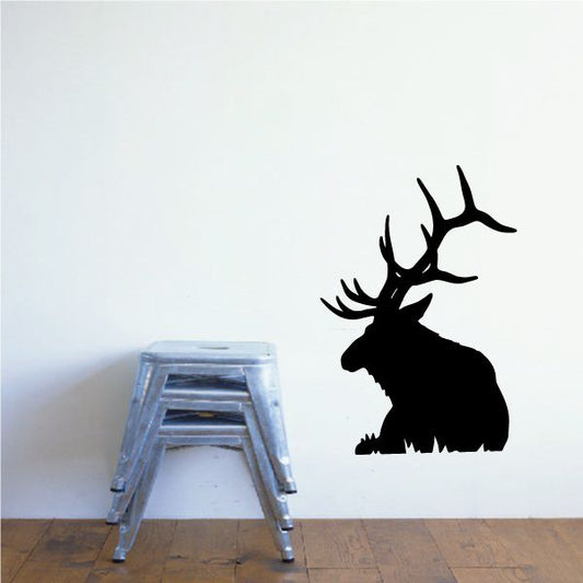 Image of Bull Elk Sitting on Grass Decal