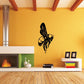 Bee decal featuring black and yellow bee design on a wall