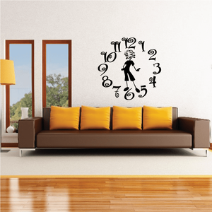 Wall clock decal with ornate numbers and small dancing woman figure in black
