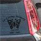 In Loving Memory butterfly vinyl decal with decorative wings and placeholder text