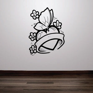Angel wings vinyl decal with heart ribbon and small flower outlines