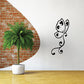Butterfly vinyl wall decal, black outline with curled tail and swirls