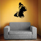 Black butterfly vinyl wall decal above a gray sofa
