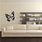 Black butterfly vinyl wall decal with two wings and curved antennae