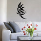 Black butterfly vinyl wall decal with decorative swirls and antenna