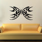 Butterfly vinyl wall decal with ornate black wings and central jewel