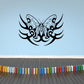 Butterfly vinyl wall decal with blue and black wings, symmetrical ornamental design