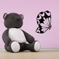 Butterfly wall decal with black circular design and pale pink wings