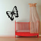 Butterfly wall decal with black and white wings on a light surface
