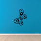 Butterfly wall vinyl decal, dark blue butterfly with dotted accents.