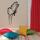Butterfly wall decal in black and white with dotted wings and thin antenna outlines