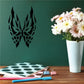 Butterfly wall decal: black wing design on green wall, cutout vinyl