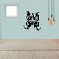 Ornate black butterfly wall decal with curled antennae and wings