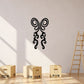 Ornate black butterfly vinyl wall decal with swirling wings and tail