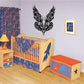 Ornate black butterfly wall decal with swirling tribal pattern