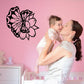 Butterfly wall decal with pink floral design and black outline