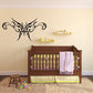 Butterfly wall decal in black with ornate symmetrical scrolling wings