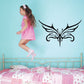 Black ornate butterfly wall decal with decorative filigree wings