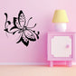 Butterfly vinyl wall decal, black and pink speckled wings with curved antennae.
