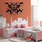 Black butterfly vinyl wall decal with ornate center and dotted accents