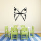 Butterfly wall decal with black outline and white wings with dot accents