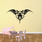 Butterfly wall decal in black with ornate tribal-style wings