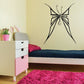 Black butterfly wall decal with web-like lines and bow center