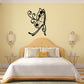 Butterfly vinyl wall decal with two wings and scroll details in black