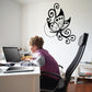Butterfly wall vinyl decal with black swirling wings and decorative flourishes