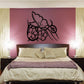 Butterfly wall decal with flowers and leaves, black outline.