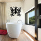 Butterfly wall decal vinyl sticker, black butterfly with decorative wings on a wall