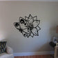 Butterfly vinyl wall decal in black with dotted wing design and antennae.