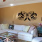 Black butterfly wall decal with ornate wing swirl designs