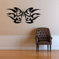 Black butterfly wall decal with ornate tribal-style wings