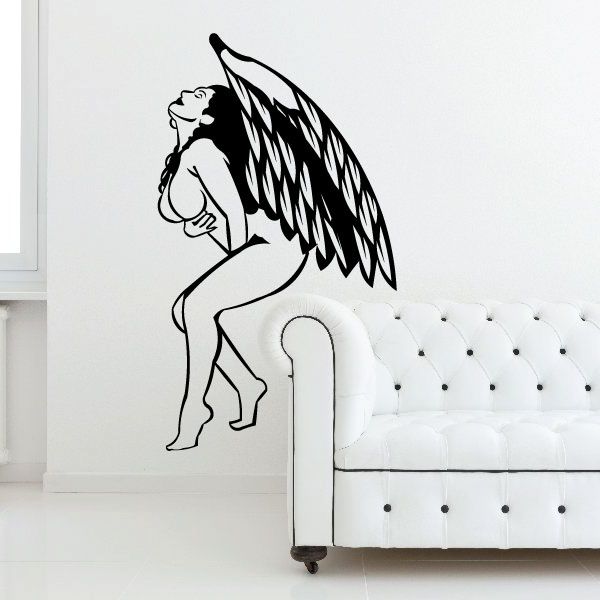 Angel wall decal, black line-art winged figure in seated pose