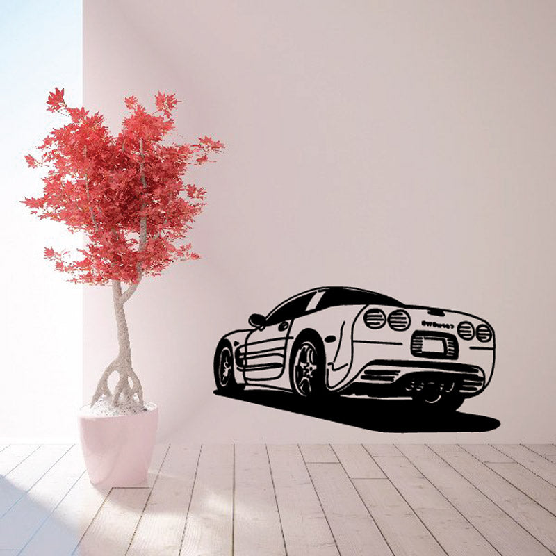 Black-and-white sports car decal with side view graphic.