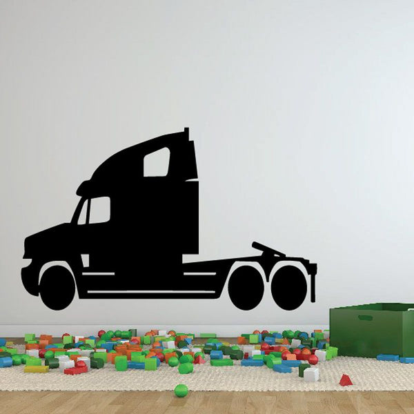 Vinyl truck wall decal of a black cab and semi trailer wheels