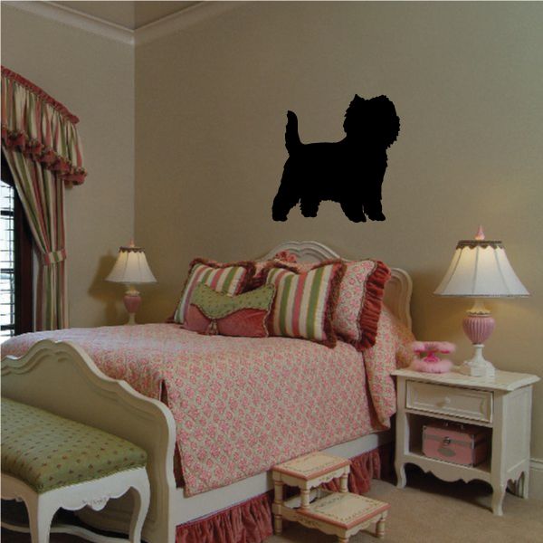 Black cairn terrier silhouette wall decal above bed