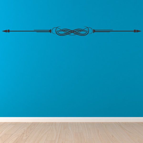 Double pointed arrow vinyl decal with calligraphic knot ornament in the center