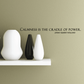 Black quote wall decal: “Calmness is the cradle of power” and “Josiah Gilbert Holland”