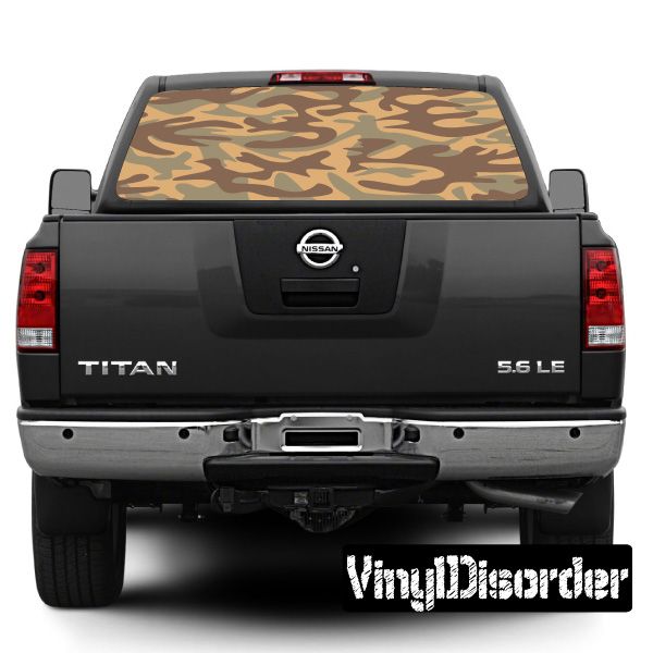 Camouflage rear window view graphic on dark pickup truck tailgate