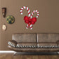 Candy cane and ribbon wall sticker with red bow and white-red striped canes