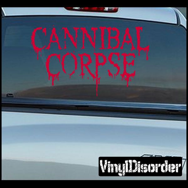 Cannibal Corpse decal with red dripping gothic lettering on a dark surface