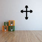 Black capped cross wall decal with arrows pointing up, down, left, and right