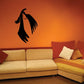 Black cartoon crow flapping decal with spread wings and beak