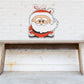 Cartoon Santa sticker with smiling character in red suit and white beard