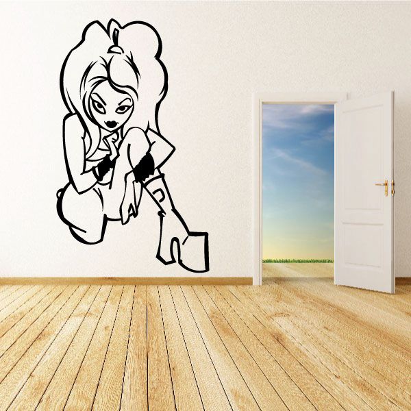 Cartoon wall decal of stylized girl in black-and-white outline, kneeling pose