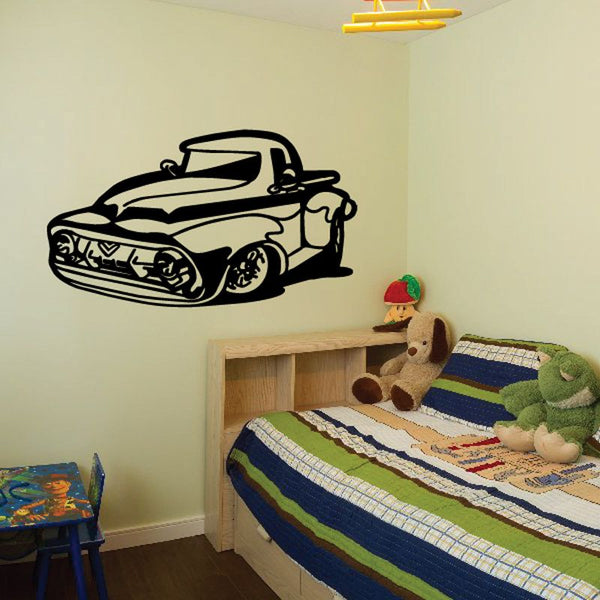 Cartoon truck wall decal, black outline vinyl sticker on a wall